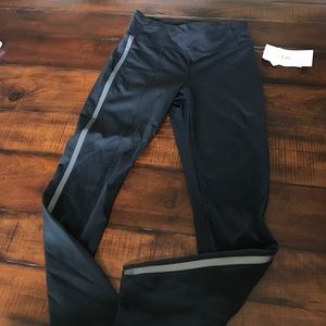 Athleta black leggings with gray stripe sz small